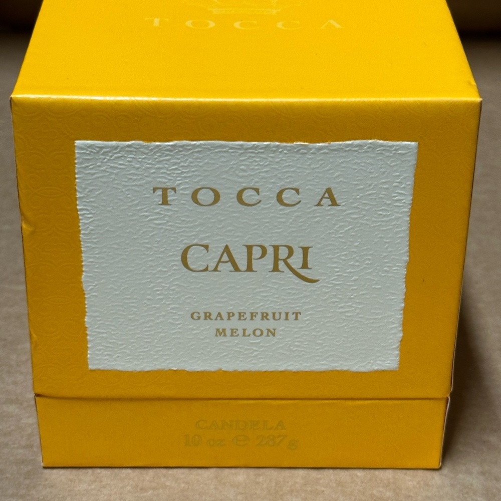 TOCCA CAPRI GRAPEFRUIT MELON 10 OZ. CANDLE (BRAND NEW IN BOX, NEVER USED)